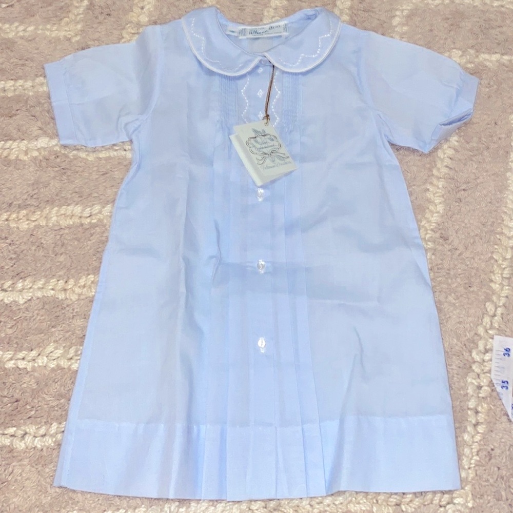 Baby blue boys day gown.